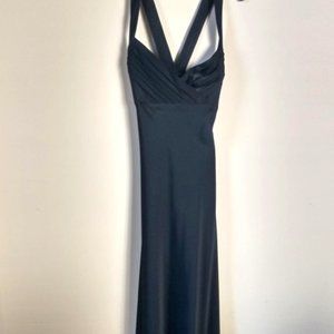 Black Calvin Klein floor length silk-look gown w/ front pleats / crossed straps